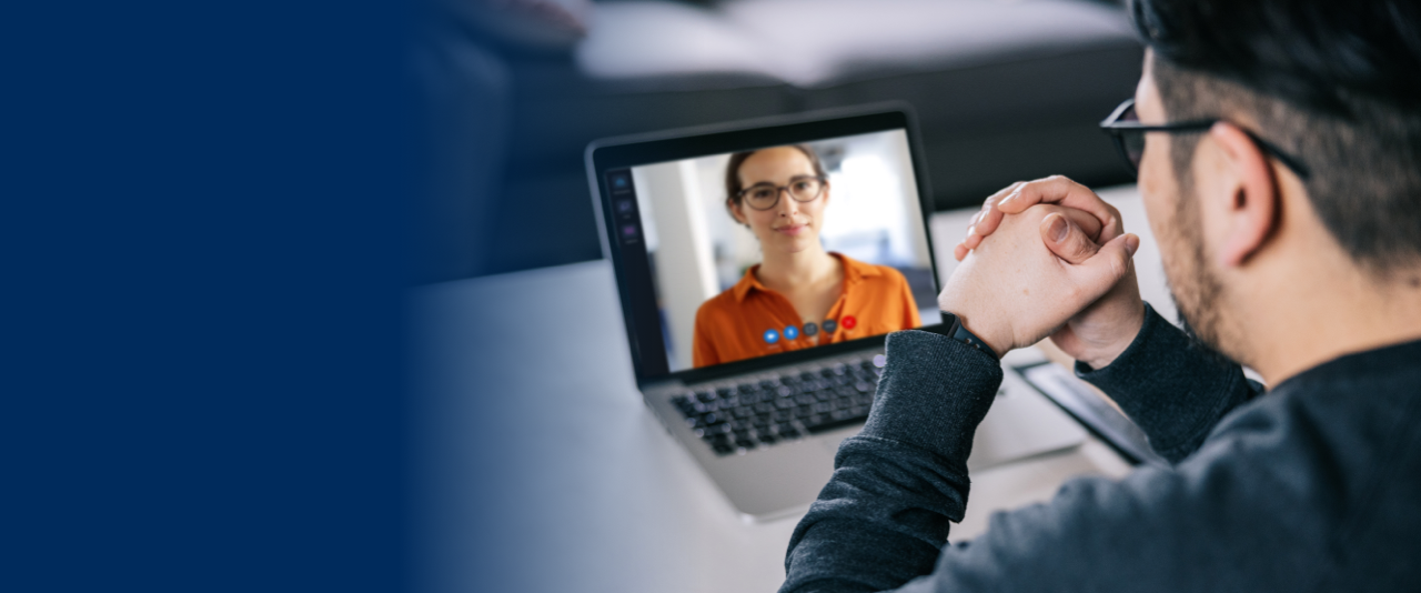 patient talking to his therapist online